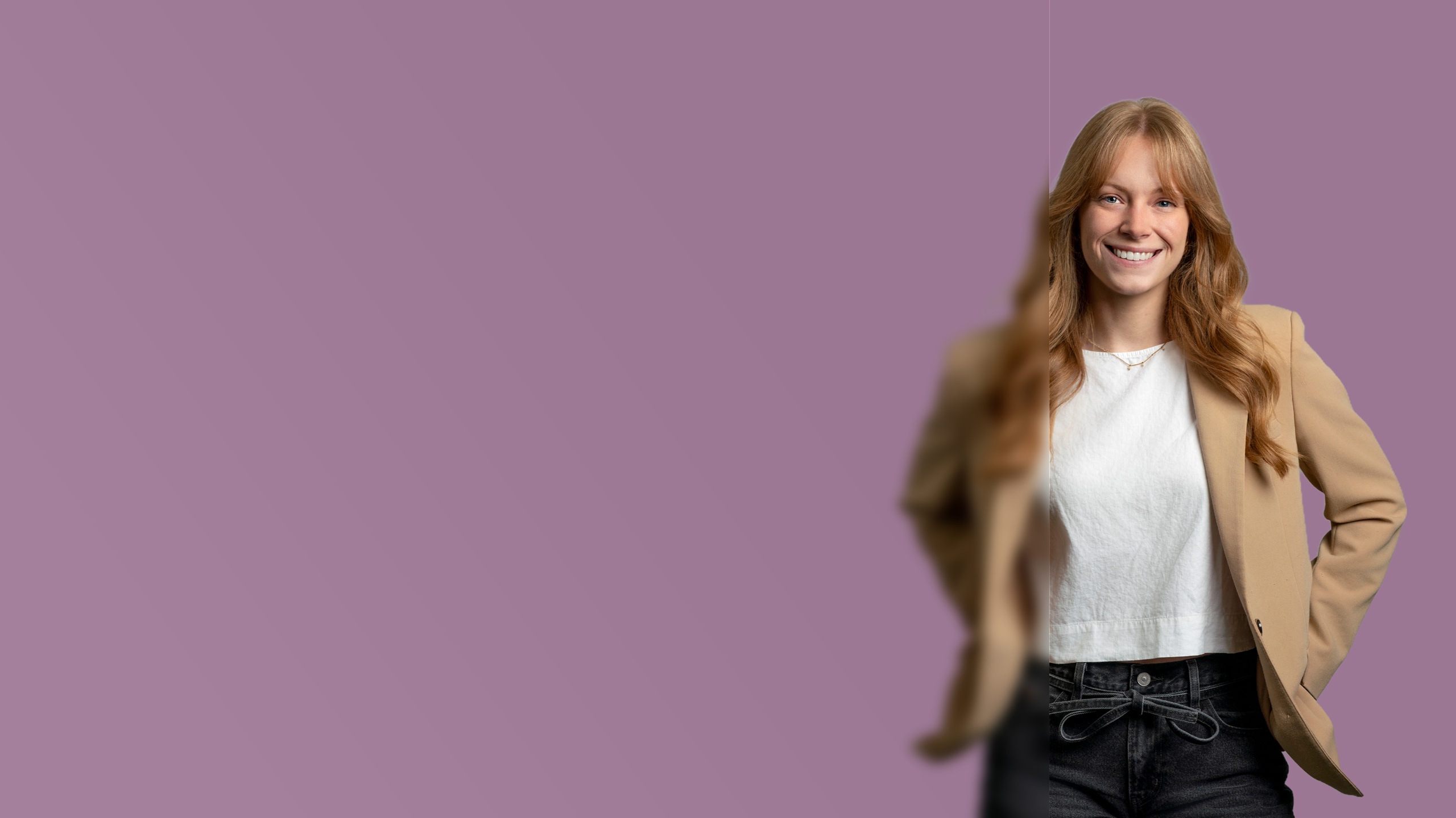 Smiling professional in a tan blazer